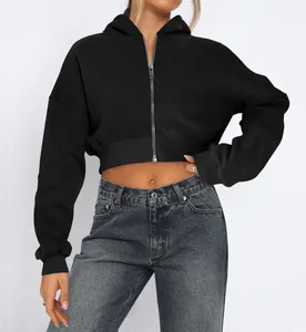 Women's stylish cropped fleece zip-up hoodie featuring long sleeves and ribbed hem