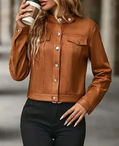 Detail of brown faux suede jacket with silver buttons and stand collar for women.