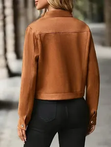 Detailed rear view of brown suede women's short jacket featuring elegant seam work