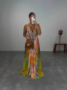 Robe longue bohème à licou sans manches imprimée élégante pour femmes en été.