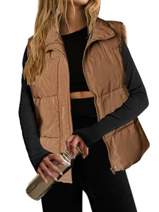 Women's lightweight brown puffer vest featuring a stand collar and secure zipper closure