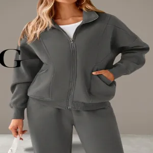 Women's cozy gray two-piece fleece tracksuit with zip-up hoodie and loose joggers