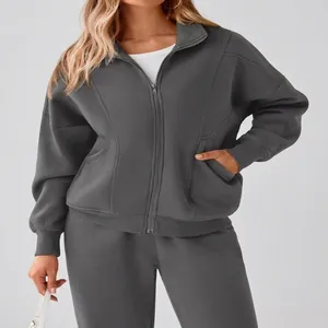 Two-piece dark gray fleece tracksuit for women with casual zip-up hoodie and pants