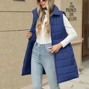 Long blue quilted puffer vest for women with zipper closure and stand-up collar.