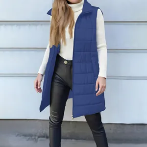 Close-up of a women's blue mid-length quilted vest with zipper and pockets