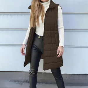 Detailed view of women's brown mid-length quilted puffer vest featuring zipper and pockets