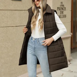 Detailed shot of a stylish brown longline padded puffer vest for women featuring side buttons