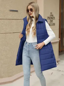 Women's mid-length navy blue quilted puffer vest with zipper and functional side pockets