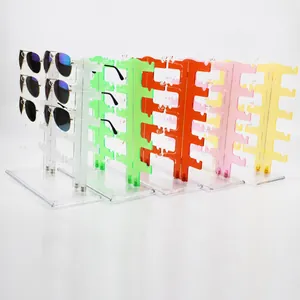 Multi-color plastic sunglass display stands showing various colors and double-row design