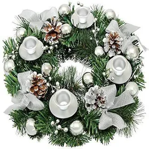 Christmas Advent wreath candle holder with silver ornaments and pine cones