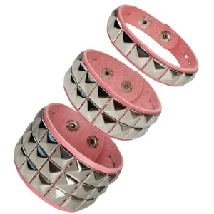 Three pink punk leather bracelets featuring one, two, and three rows of silver studs.
