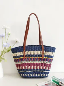 Large colorful striped handmade straw tote bag for beach and summer vacations style.