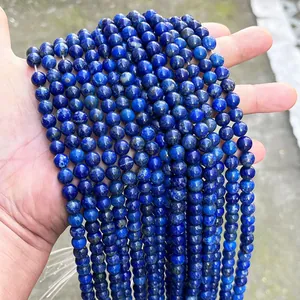 Macro view of natural blue lapis lazuli round beads strands for DIY jewelry