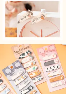 Cute cartoon cat-themed sticky index notes showing various feline designs and paw shapes