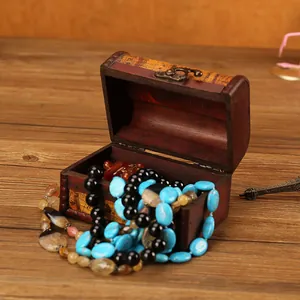 Classic vintage antique style wooden jewelry chest with decorative map pattern storage box