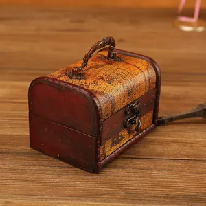 Vintage wooden treasure chest with antique globe map design and ornate metal handle