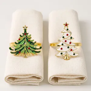 Christmas tree napkin rings with colorful enamel and rhinestone accents for holiday table decor