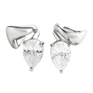 Detailed view of silver-toned twisted ear cuffs featuring teardrop clear zircons