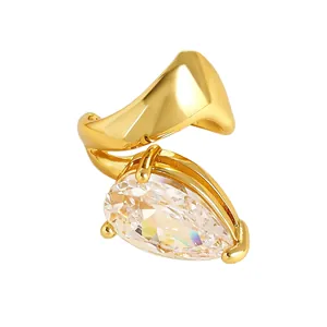 Close-up of water drop zircon ear cuff with twisted gold lines for non-pierced ears.