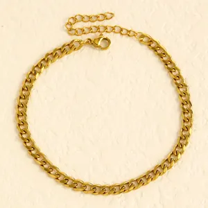 Macro detail view of the high-quality gold-plated stainless steel curb chain anklet