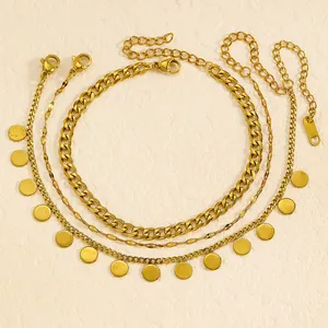 Detailed view of three-layer gold stainless steel anklet set with disc pendants