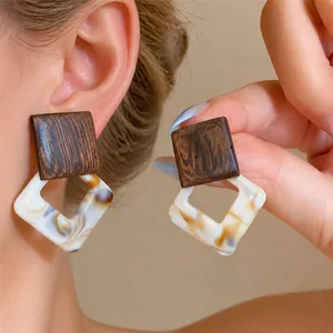 Vintage wooden geometric drop earrings with elegant marble pattern resin dangles
