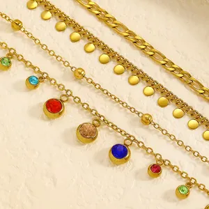 Detail shot of multi-layer gold stainless steel anklet set with colorful crystal charms