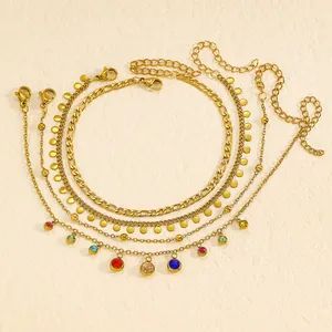 Detail view of multi-layer stainless steel anklet set with colorful drip oil charms