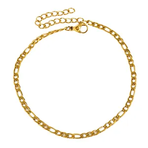 Detailed view of a gold-plated stainless steel Figaro chain anklet with lobster clasp