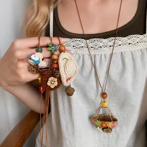 Pastoral style woven basket and hat pendant necklace with wooden beads and flowers