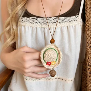 Handmade crochet sun hat pendant necklace with acorn charm and rustic brown leather cord