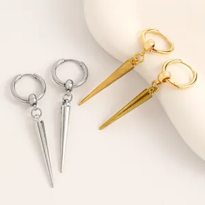 Detailed view of punk gothic style spike hoop earrings in gold and silver finishes