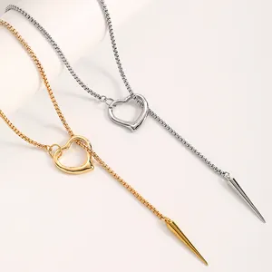 Detailed view of Gothic punk Y-shaped necklace with heart slider and rivet spike pendant