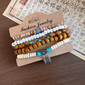 Detailed macro view of vintage elastic bracelet set featuring natural wood beads and turquoise accents.