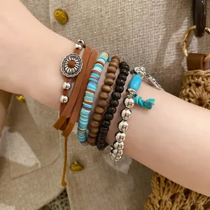 Handmade bohemian layered bracelet set with leather wood stone beads and floral charm