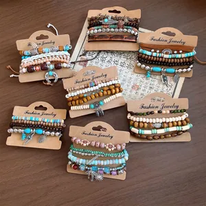 Detail view of multi-layered bohemian bracelet sets with wood beads and leather