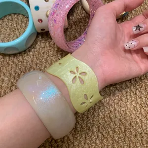 Collection of stylish retro acrylic geometric bangles in various colors and designs