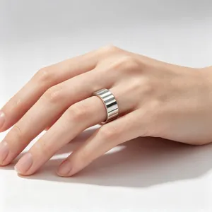 Detailed view of 9mm wide titanium steel ring with industrial gear vertical stripes