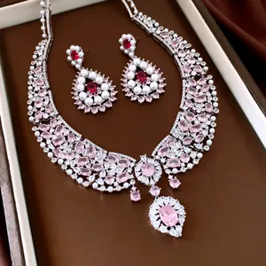 Detailed view of luxury silver-needle jewelry set with pink zirconia and pearls