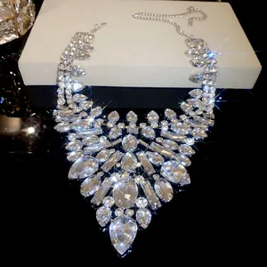 Detailed view of luxury sparkling rhinestone statement necklace for formal banquet occasions.
