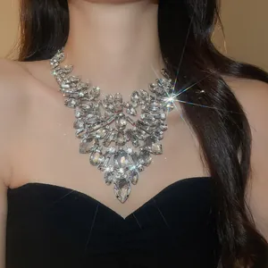 Detailed close-up of a luxury heavy rhinestone statement necklace for banquet wear