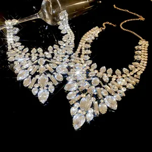 Macro shot of luxury rhinestone statement necklace with sparkling teardrop crystal details.