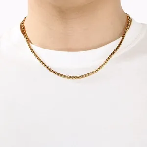 Close-up detail of a gold stainless steel round link necklace with magnetic buckle