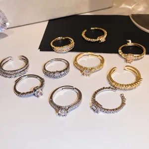 Σετ 9 ανοιχτών δαχτυλιδιών με επιχρύσωση 18k, ζιργκόν και κομψό σχέδιο για γυναίκες.