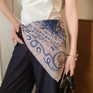 Detail of a printed polyester square bandana tied around a model's waist as a fashion accessory