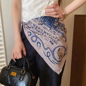 Detailed macro view of Western style printed bandana used as a waist accessory.