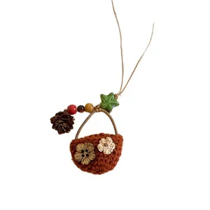 Handmade woven basket pendant necklace with pine cone and colorful beads for summer vacation