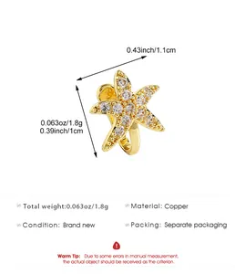 Vue détaillée d'un clip de nez étoile de mer dorée orné de zircons étincelants