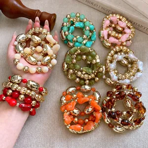 Conjunto de pulseras elásticas con cuentas geométricas doradas y acrílico de colores