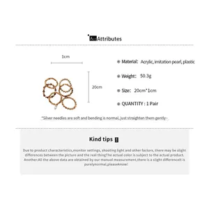 Detail view showing acrylic and imitation pearl beaded bracelet set specifications